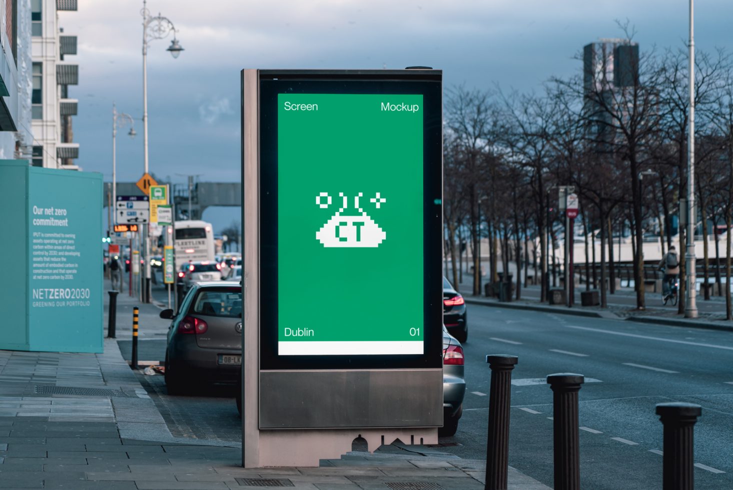 Urban digital billboard mockup on a street with a green pixelated screen design, ideal for presentations and advertising, clear city backdrop.